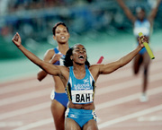 Debbie Ferguson wins the relay event for the Bahamas.