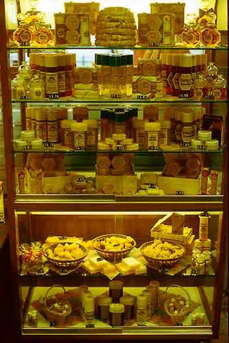 Two attractive displays of various cosmetic items, all containing one or more primary bee products (left: M&uuml;ngersdorff, Germany; right: La casa de miel Argentina).