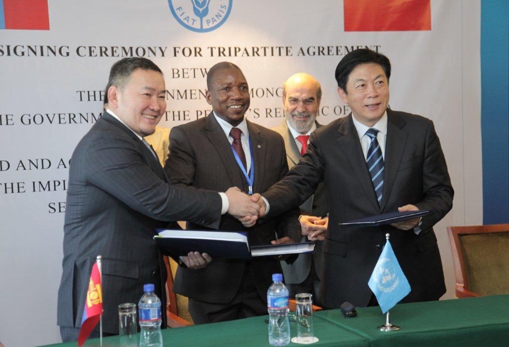 14 March 2014 - China, Mongolia, FAO sign South-South Cooperation agreement (Phase II) during APRC. From left to right: Khaltmaa Battulga, Minister for Industry and Agriculture, Mongolia, Percy Misika, FAO Representative for Mongolia, José Graziano da Silva, FAO Director-General, Sun Zhonghua, Chief Agronomist, People’s Republic of China 