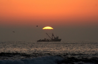 Fishboat at sunset