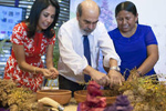 The FAO Director-General, the First Lady of Peru and the Bolivian Minister during the harvest ©FAO/Giuseppe Carotenuto