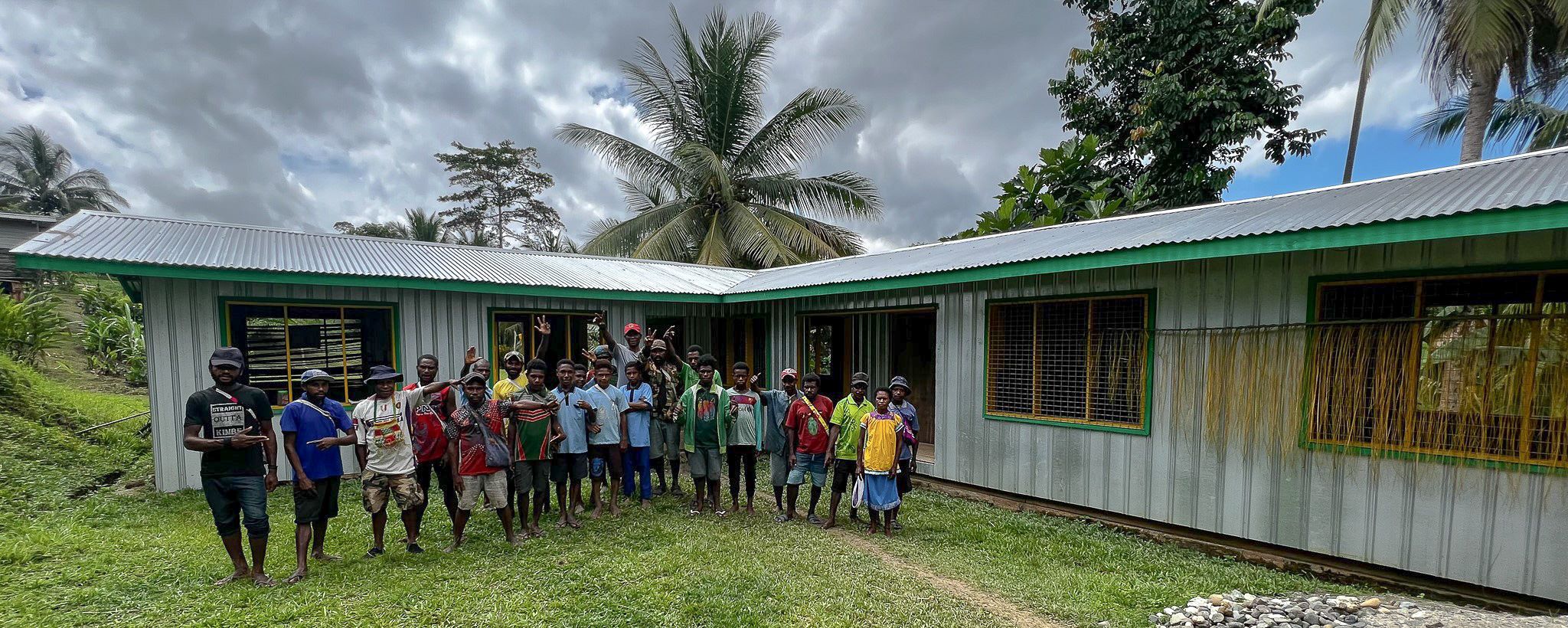 A new permanent structure elementary classroom built by the Hambini villagers, replacing the old space for children's education.