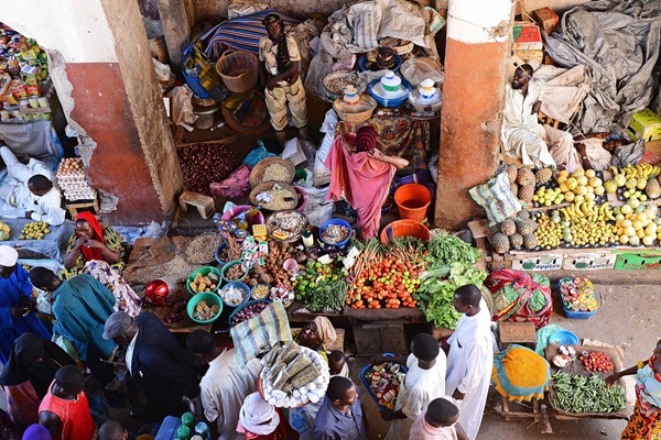 Njemena, Chad - Vendors selling vegetables at the central market