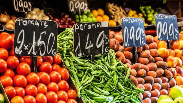 Fruits and vegetables displayed on market stall